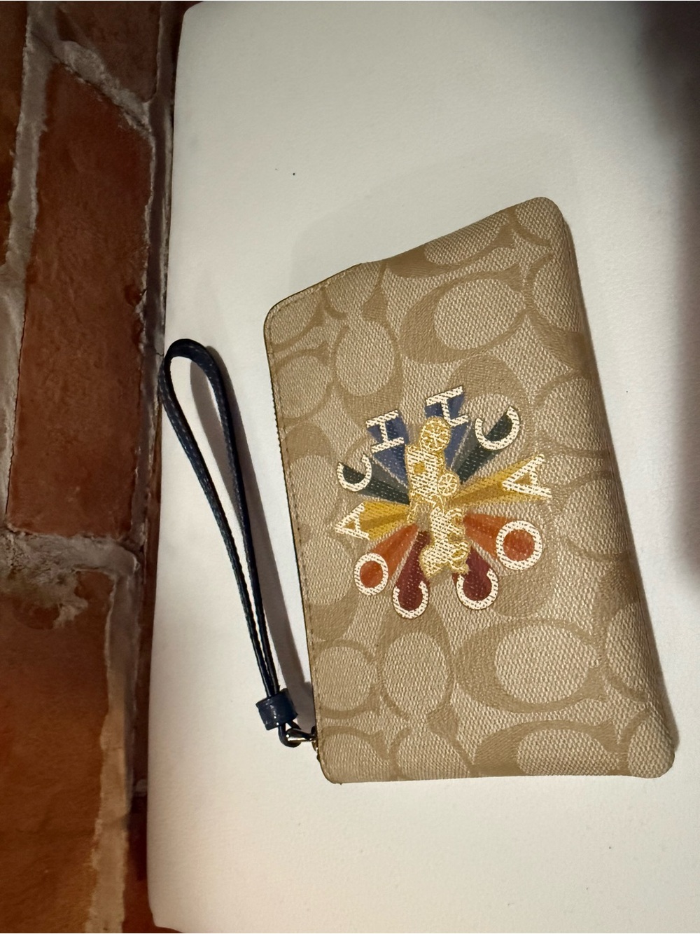 Coach Beige Signature Canvas Wristlet with Multicolor Logo Embroidery
